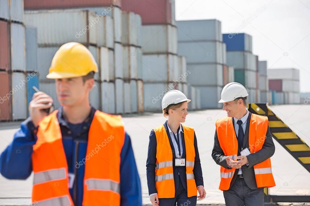 Worker using walkie-talkie 