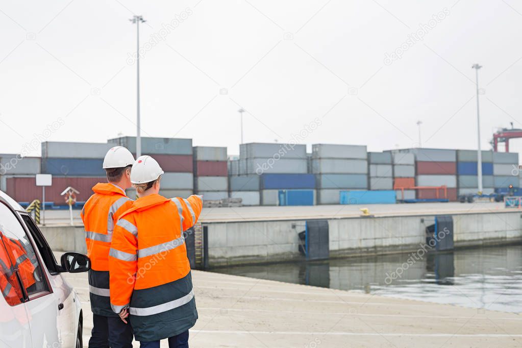 Workers in shipping yard