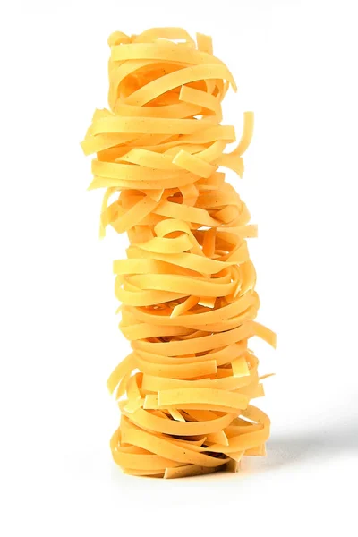 Nudelnest mit Tagliatelle — Stockfoto