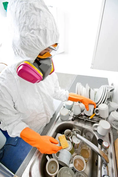 Female in gloves washing kitchenware — Stock Photo, Image