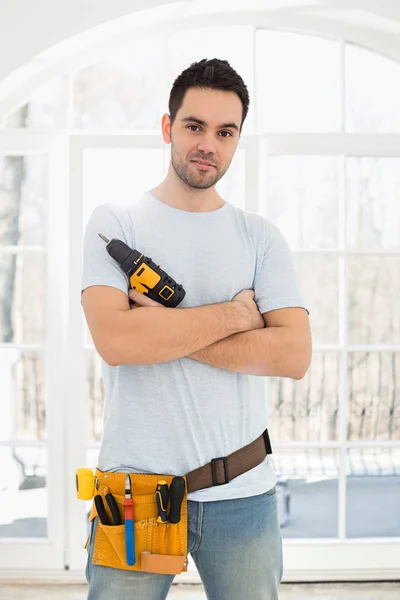 Confident man with hand drill — Stock Photo, Image