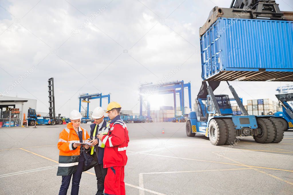 Workers in shipping yard