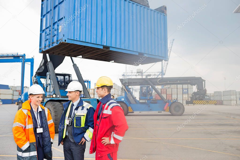 Workers in shipping yard