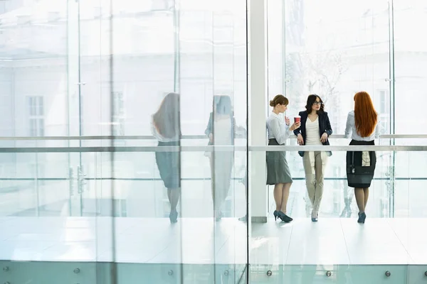 Businesswomen at office hallway — Stock Photo, Image