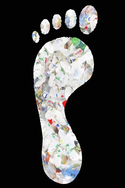 Plastikflaschen im Fußabdruck — Stockfoto