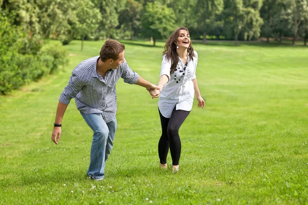 Couple enjoying in park — Stock Photo, Image