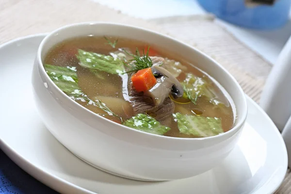 Broth soup in bow — Stock Photo, Image