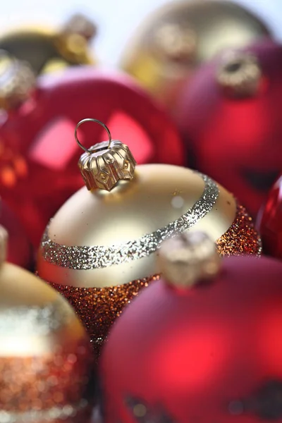 Red and golden christmass baubles — Stock Photo, Image