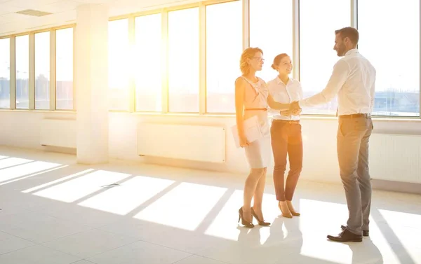 Young Businessman Greeting Businesswoman Handshake Standing Colleague New Office — Stock Photo, Image