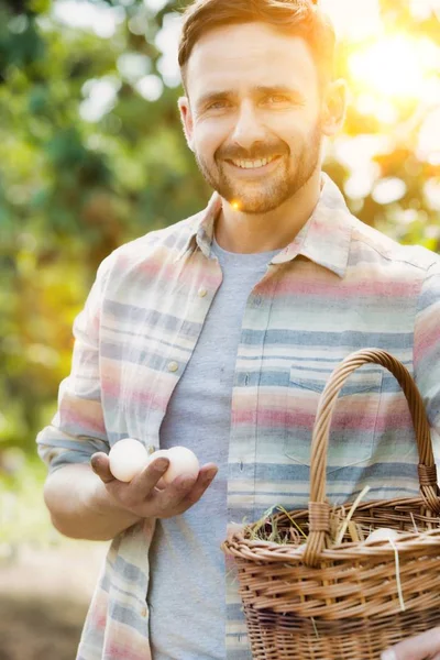 Portrait Smiling Farmer Holding Eggs Basket Farm — Stock Photo, Image