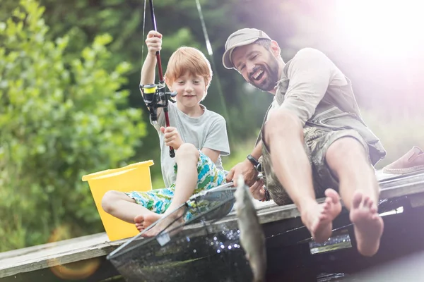 Father Son Fishing Lake While Sitting Pier — Stock Photo, Image