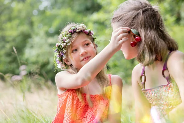 Cute Girl Holding Cherry Fruits Friend Ear Park — Stock Photo, Image