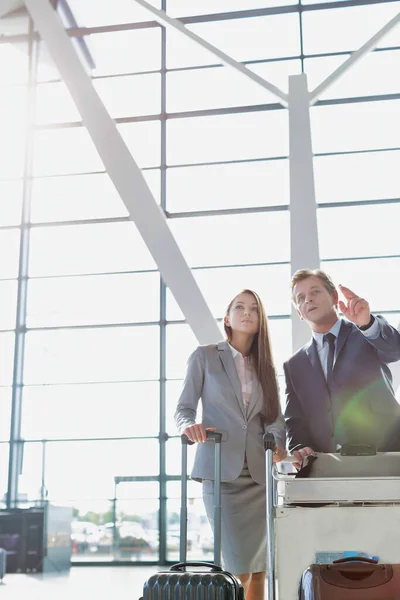 Businessman Gesturing Talking Young Attractive Businesswoman While Queuing Check Airport — Stock Photo, Image