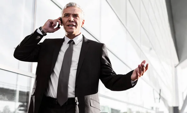 Mature Businessman Talking Smartphone Airport — Stock Photo, Image