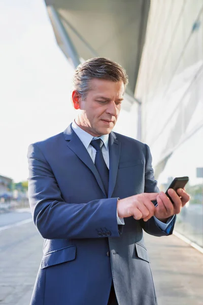 Portrait Mature Attractive Businessman Using Smartphone While Standing Front Airport — Stock Photo, Image