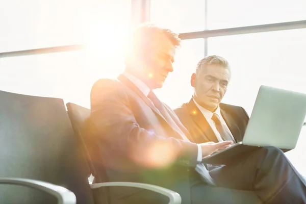 Mature Businessmen Using Laptop Airport — Stock Photo, Image