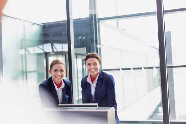 Portrait Smiling Young Attractive Passenger Service Agent Standing Airport — Stock Photo, Image