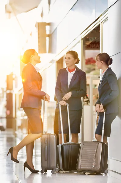 Portrait Young Attractive Flight Attendants Talking While Standing Airport — Stock Photo, Image