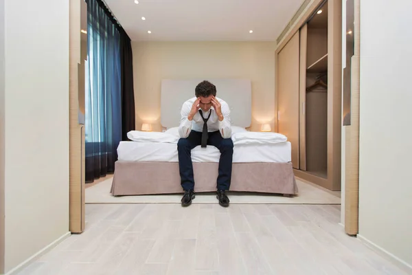 Overworked Stressed Businessman Sitting Bed — Stock Photo, Image