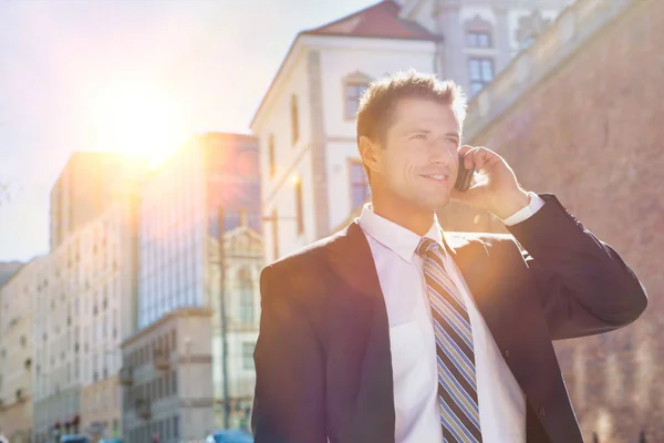 Portrait Mature Confident Businessman Smiling Talking Smartphone While Walking Pavement — Stock Photo, Image