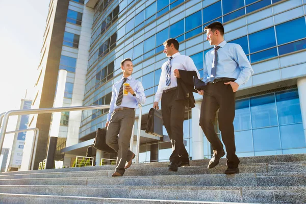Mature Businessmen Talking While Walking Downstairs Office Building Work — Stock Photo, Image