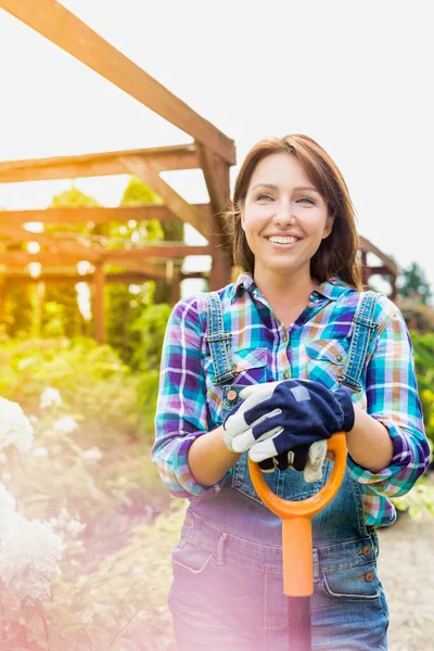 Portrait Mature Gardener Smiling While Leaning Shovel — Stock Photo, Image
