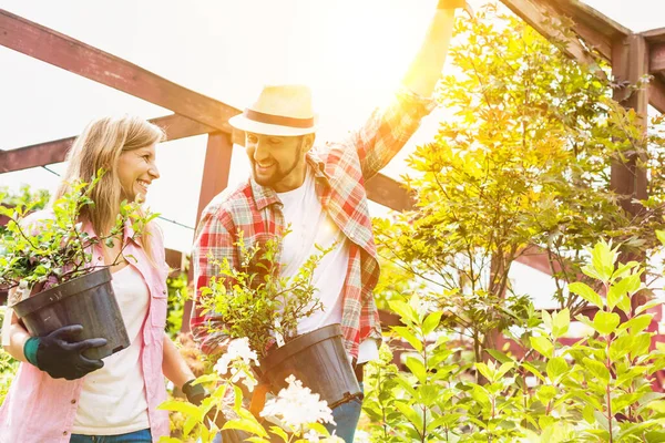 Portrait Mature Female Male Gardeners Carrying Plants Pot — Stock Photo, Image