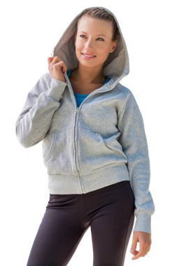 Genç, aktif, çekici bir kadının spor giysileri giymesi.