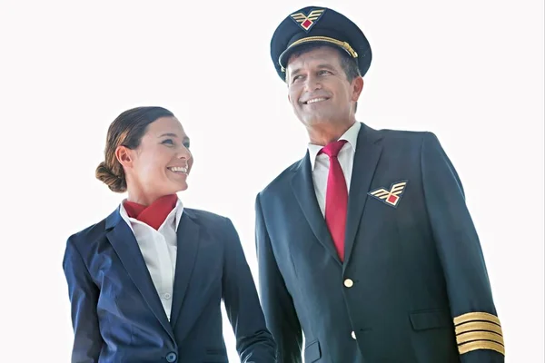 Cutouts Mature Pilot Talking While Walking Beautiful Stewardess — Stock Photo, Image