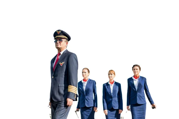 Uitsneden Van Volwassen Pilot Wandelen Met Drie Jonge Mooie Stewardess — Stockfoto