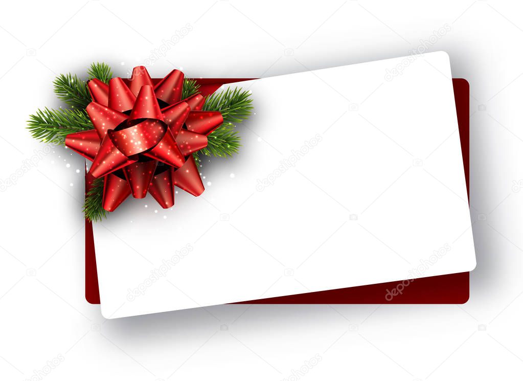White Christmas card with red bow.