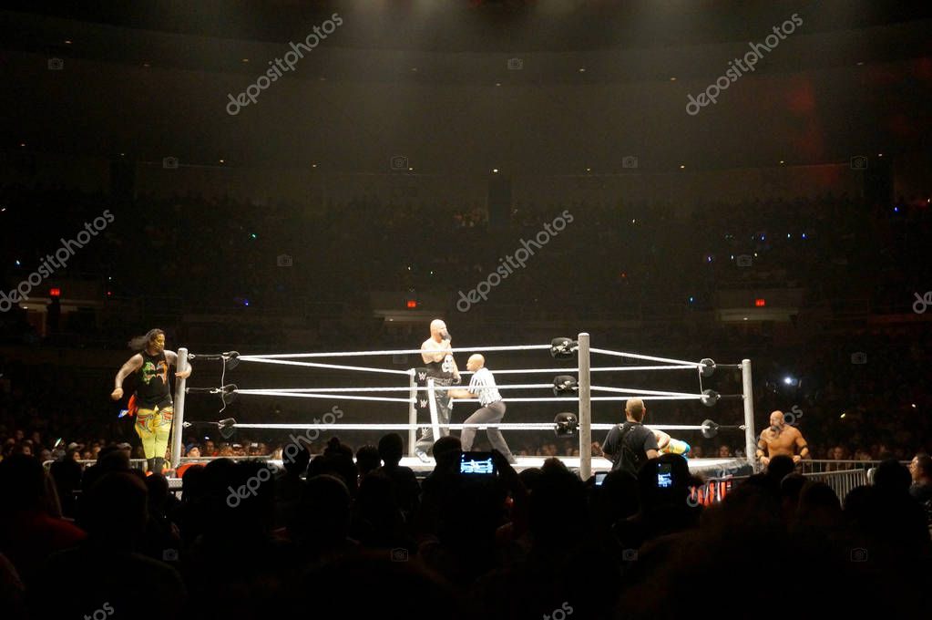 HONOLULU - JUNE 29, 2016: WWE wrestlers Karl Anderson and Luke Gallows vs the Uso's in ring at WWE event at the Neal S. Blaisdell Center, Honolulu on June 29, 2016 Honolulu, Hawaii.