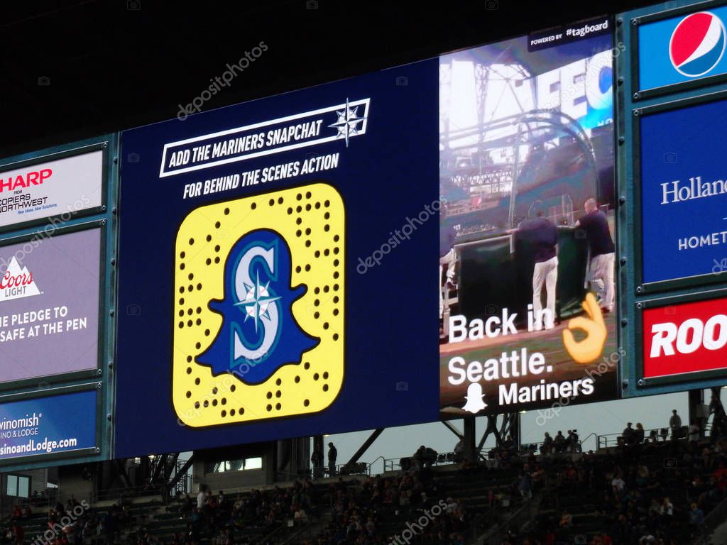 SEATTLE - JUNE 24: Snapchat ad on screen in bleachers at Safeco Field during baseball game, Seattle in June 24, 2016. Home of the Seattle Mariners (MLB).