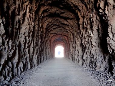 Tunnel made for trains to pass through the mountains clipart