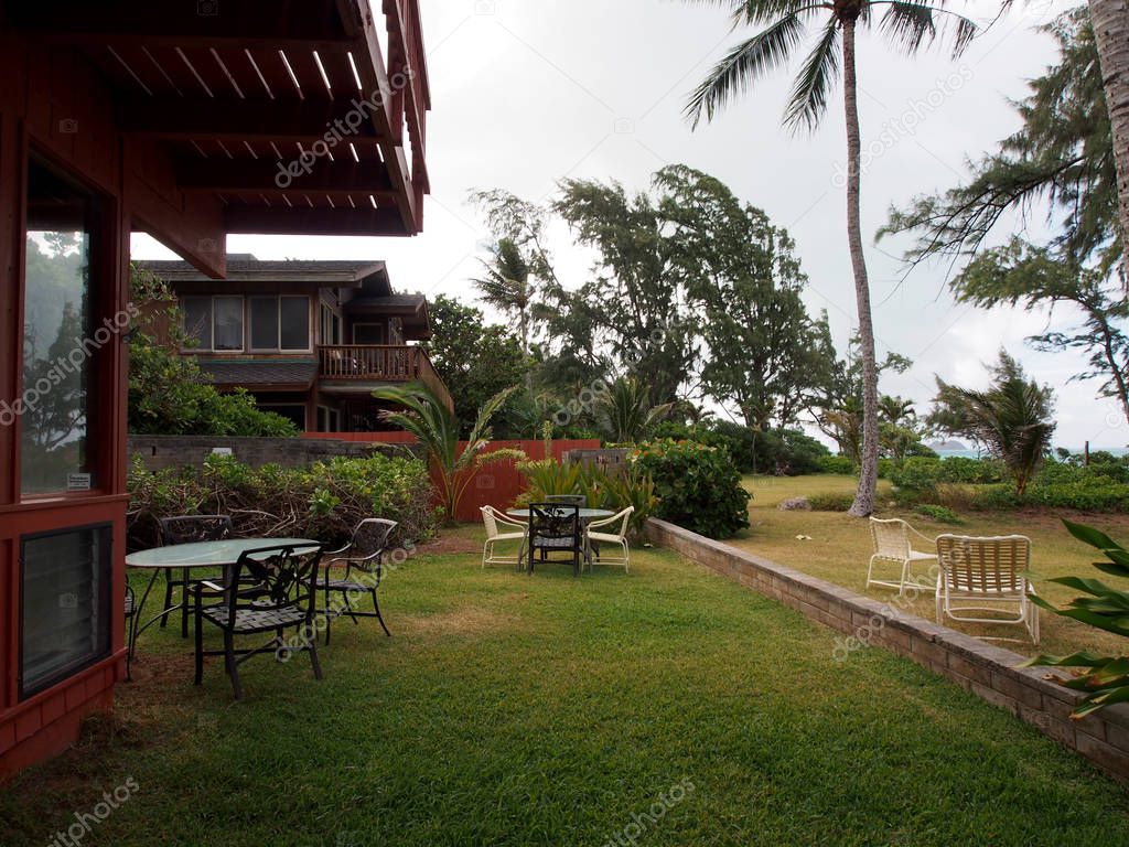 Lawn chairs in beach yard looking towrds Waimanalo Beach