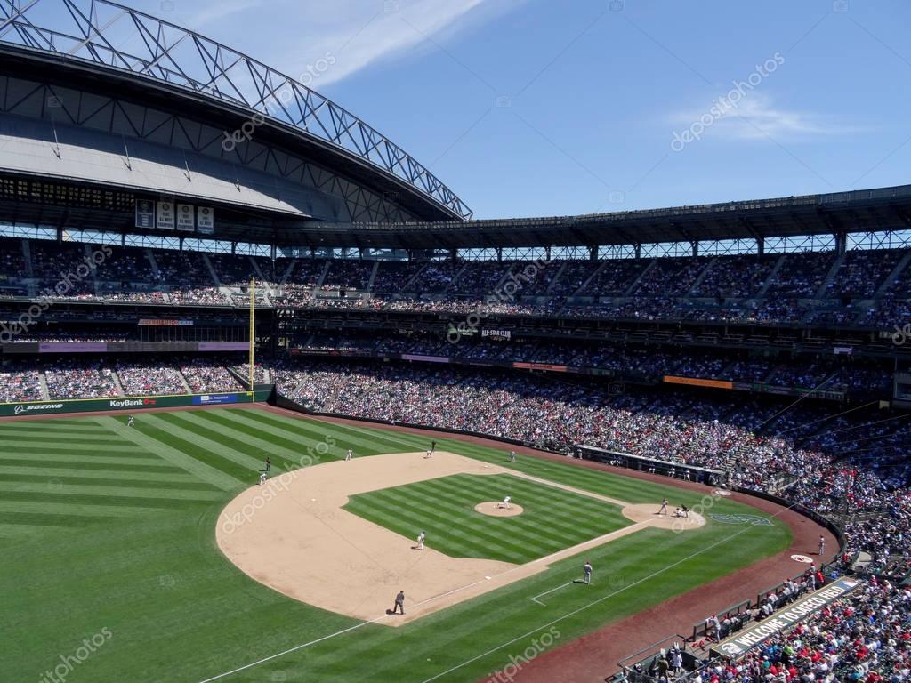 SEATTLE - JUNE 26: Mariners Pitcher steps forward to throw pitch to Cardinals batter with infield in view during baseball game at Safeco Field, Seattle in June 26, 2016.