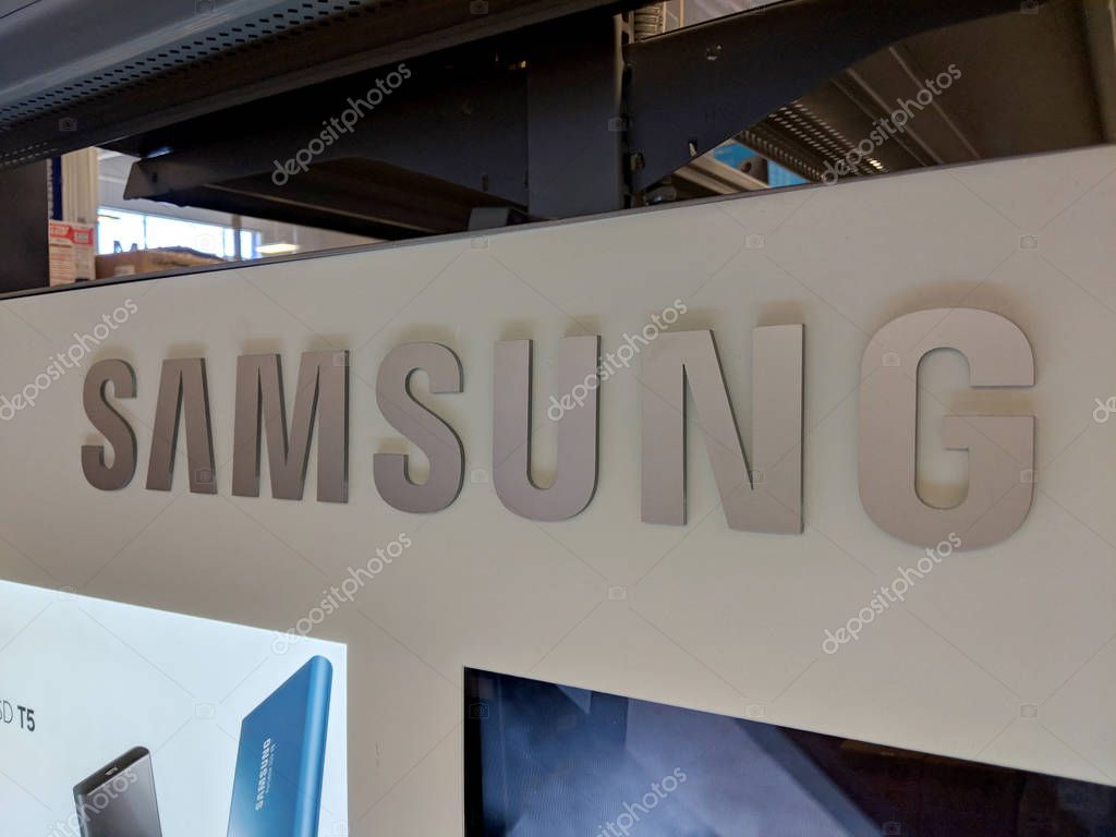 Honolulu - December 14, 2017: Samsung Logo inside Best Buy Store.  Samsung is a South Korean multinational conglomerate headquartered in Samsung Town, Seoul. It comprises numerous affiliated businesses, most of them united under the Samsung brand, an