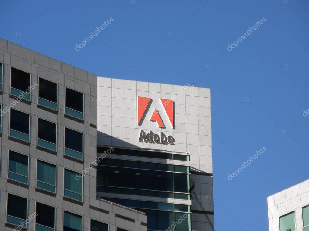 San Jose, California -  November 4, 2009:  Adobe Logo on side of Building.  Adobe Inc. is an American multinational computer software company headquartered in San Jose, California. It has historically focused upon the creation of multimedia and creat