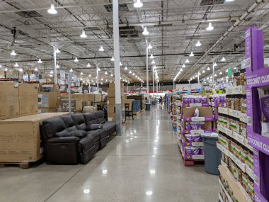 Honolulu - March 16, 2019: Couch, Food, and other supplies on Display inside Costco.