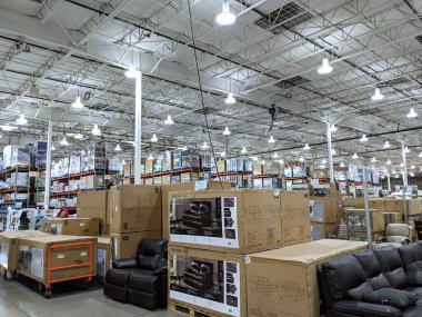 Honolulu - March 16, 2019: Couch, Food, and other supplies on Display inside Costco.