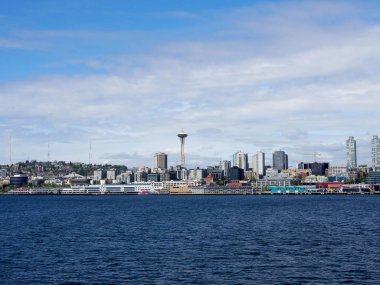 Downtown Seattle, Washington, USA - May 18, 2019: Scene of the Waterfront Park with Space Needle, and cityscape.