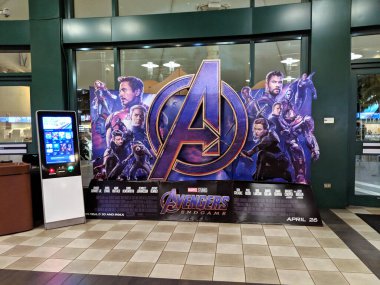 Honolulu - April 21, 2019:  Avengers Endgame Movie Poster at Ward Movie Theater in Honolulu, Hawaii. clipart