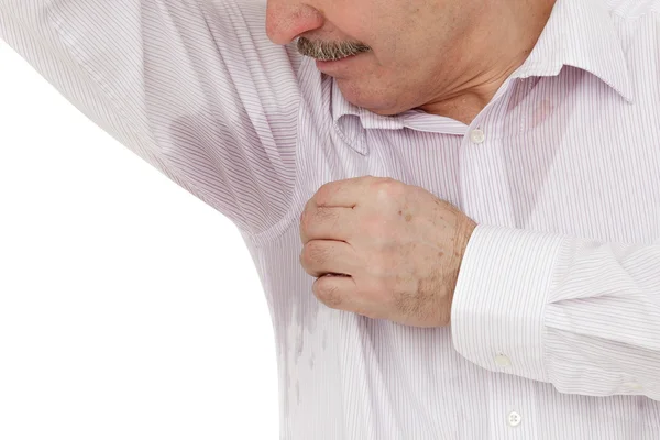 Sweaty spot on the shirt because of the heat, worries and diffidence. — Stock Photo, Image