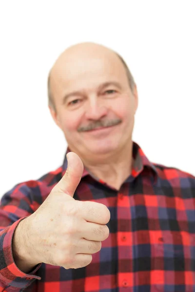 Starší muž ukazuje palec — Stock fotografie
