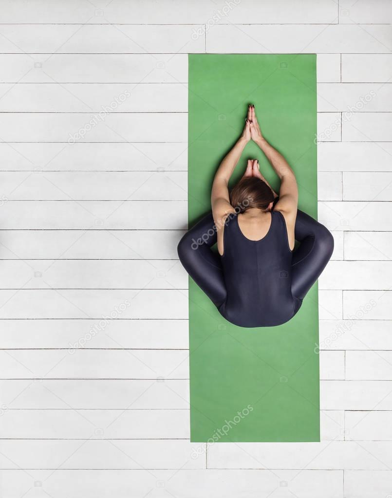  Girl doing butterfly pose 