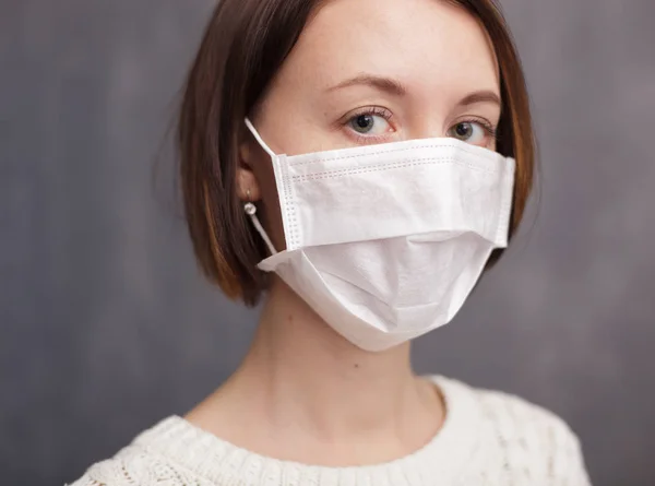 Girl in medical disposable mask — Stock Photo, Image