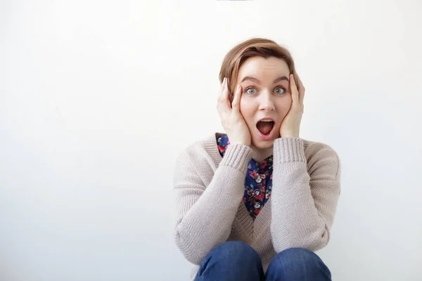 Girl in a sweater  is  Surprised — Stock Photo, Image