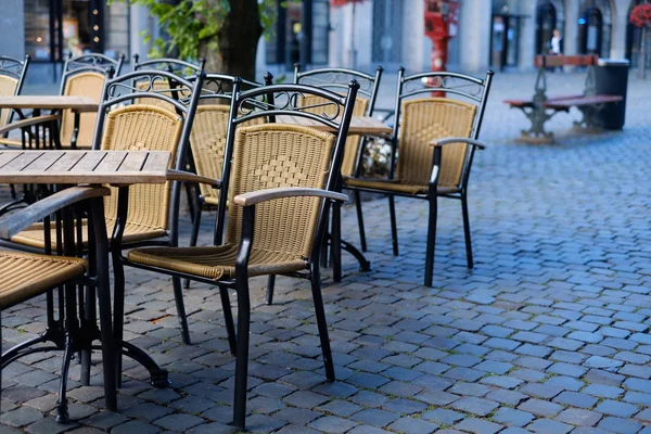 Cafe chairs outside in a street
