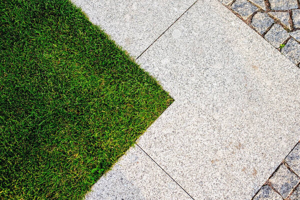 grass and stone pavement