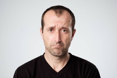 Üzgün bir adamın portresi